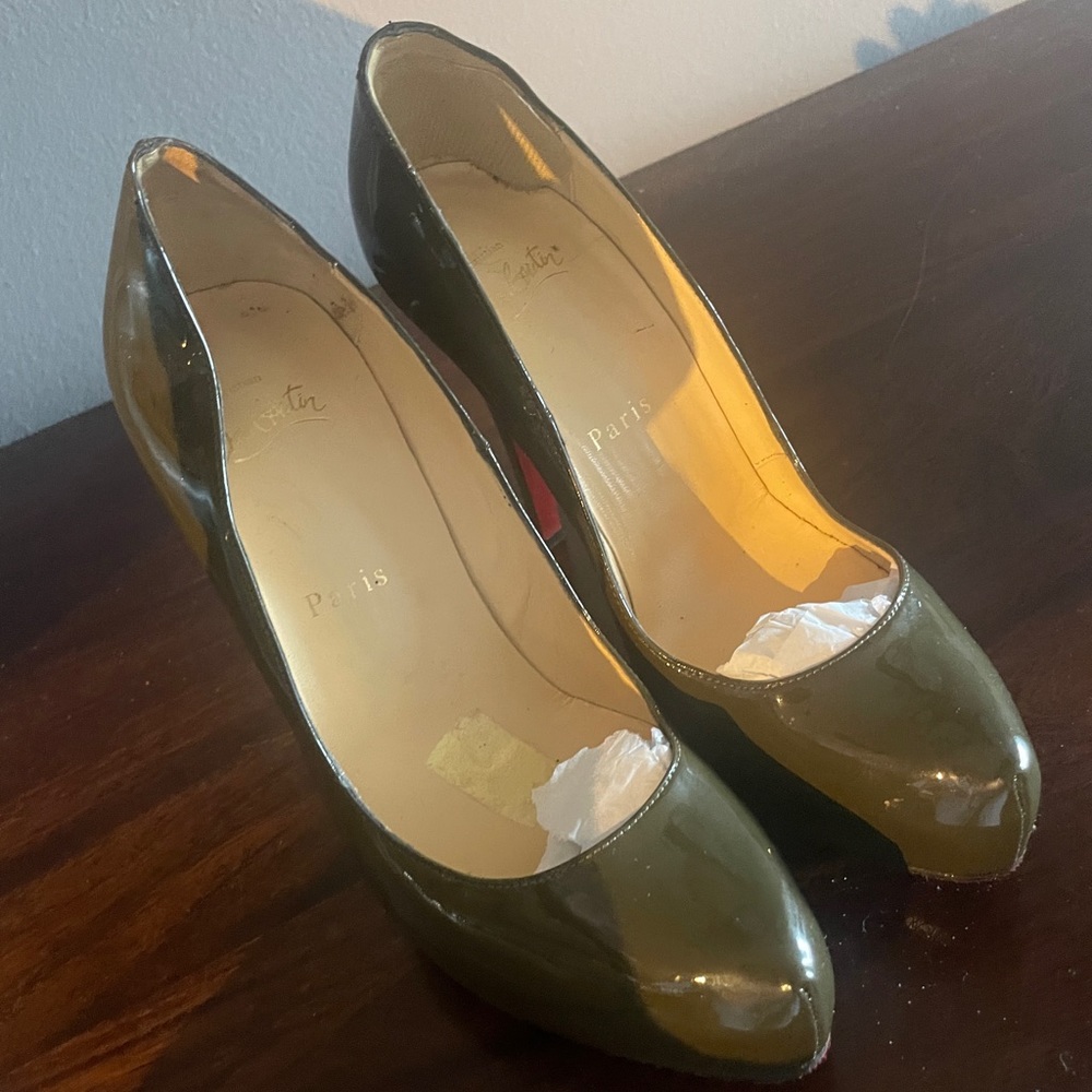 Christian Loubitan Olive green patent leather pumps.